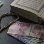 Tidak Boleh Membaca Al-Qur’an  Untuk Meminta Kepada Manusia